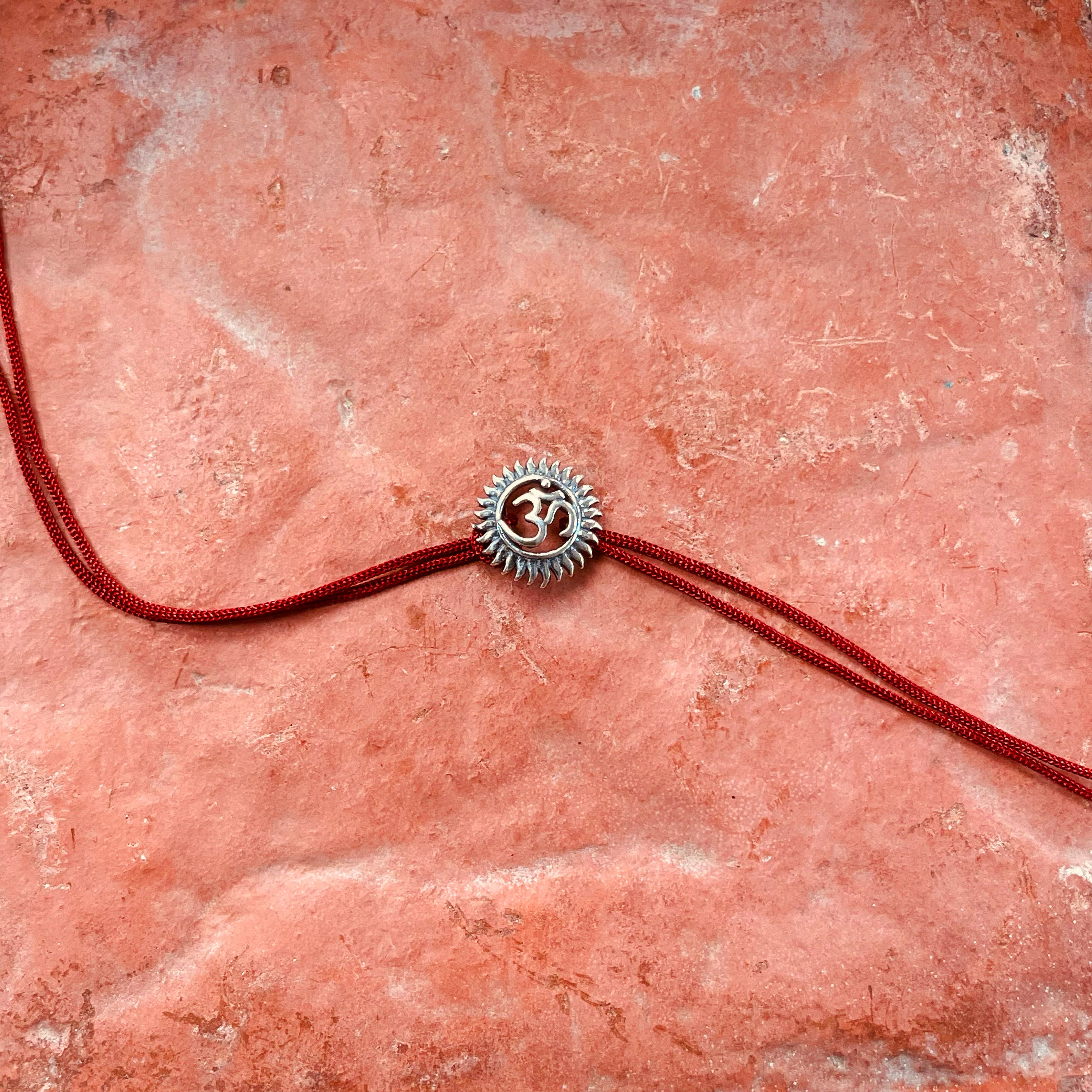 trueBrowns Sterling Silver Om Thread Rakhi