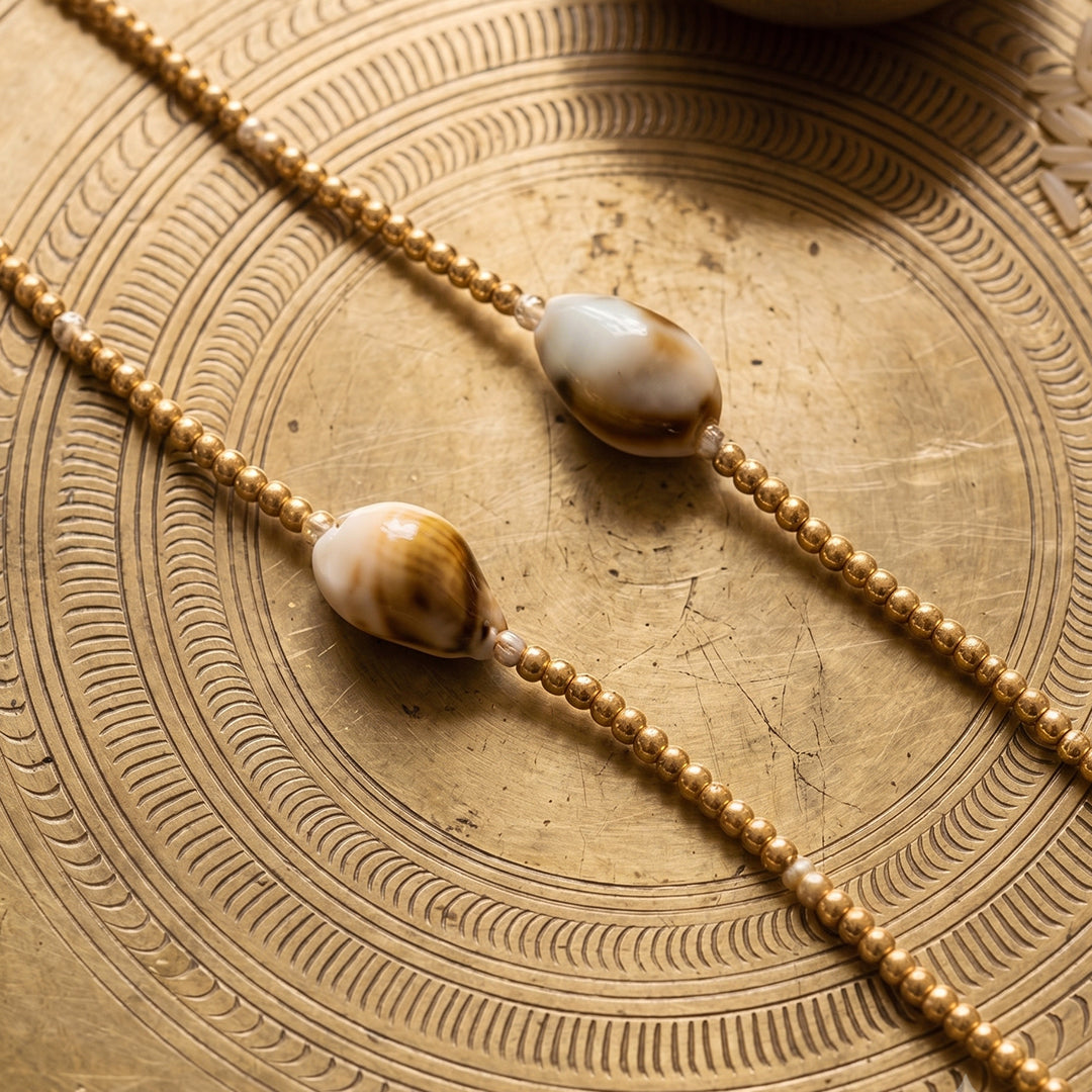 trueBrowns Gold Tone Beads with Shell Couple Bracelet Rakhi