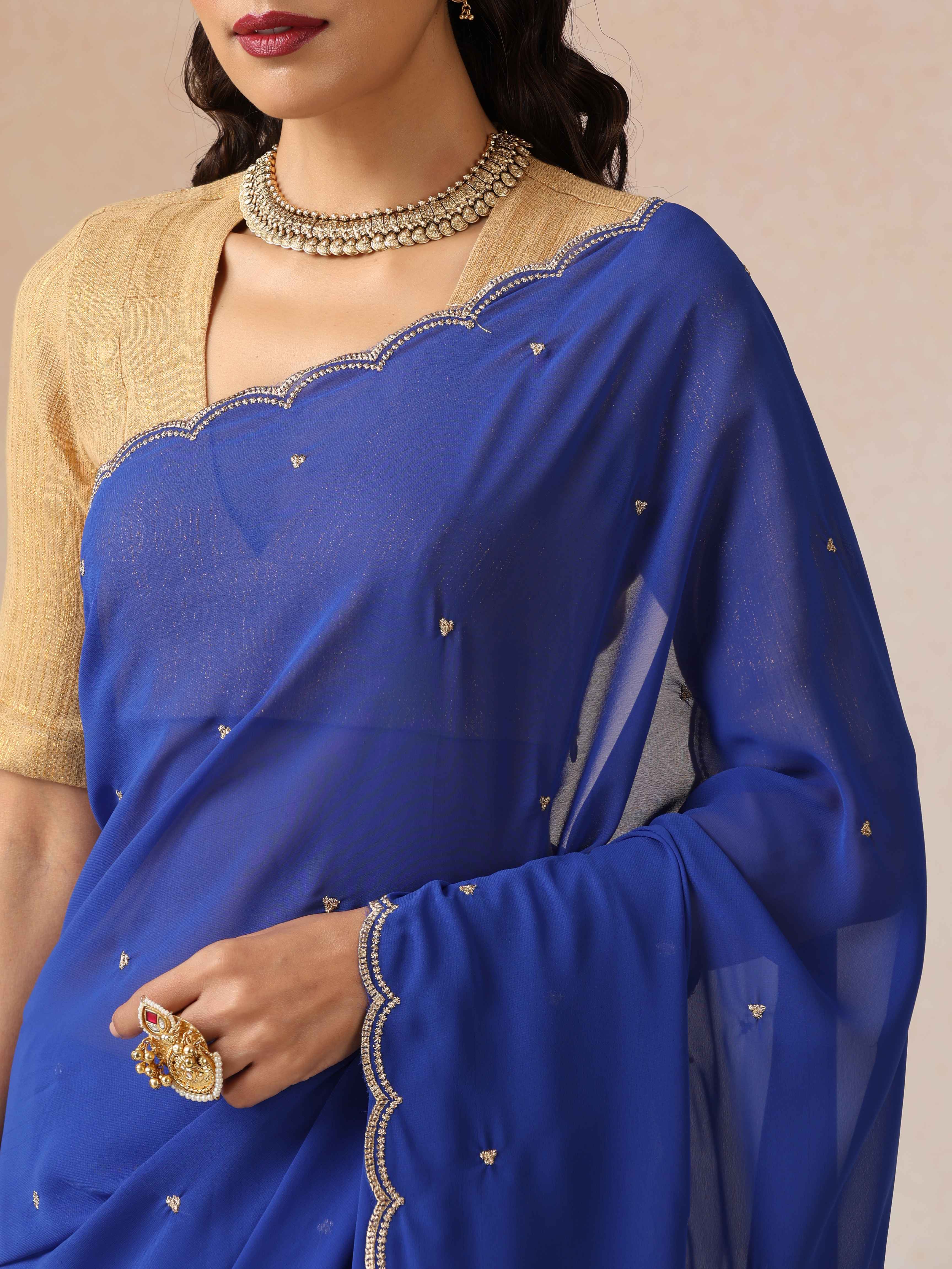 trueBrowns Blue Georgette Embroidered Saree With unstitched Blouse