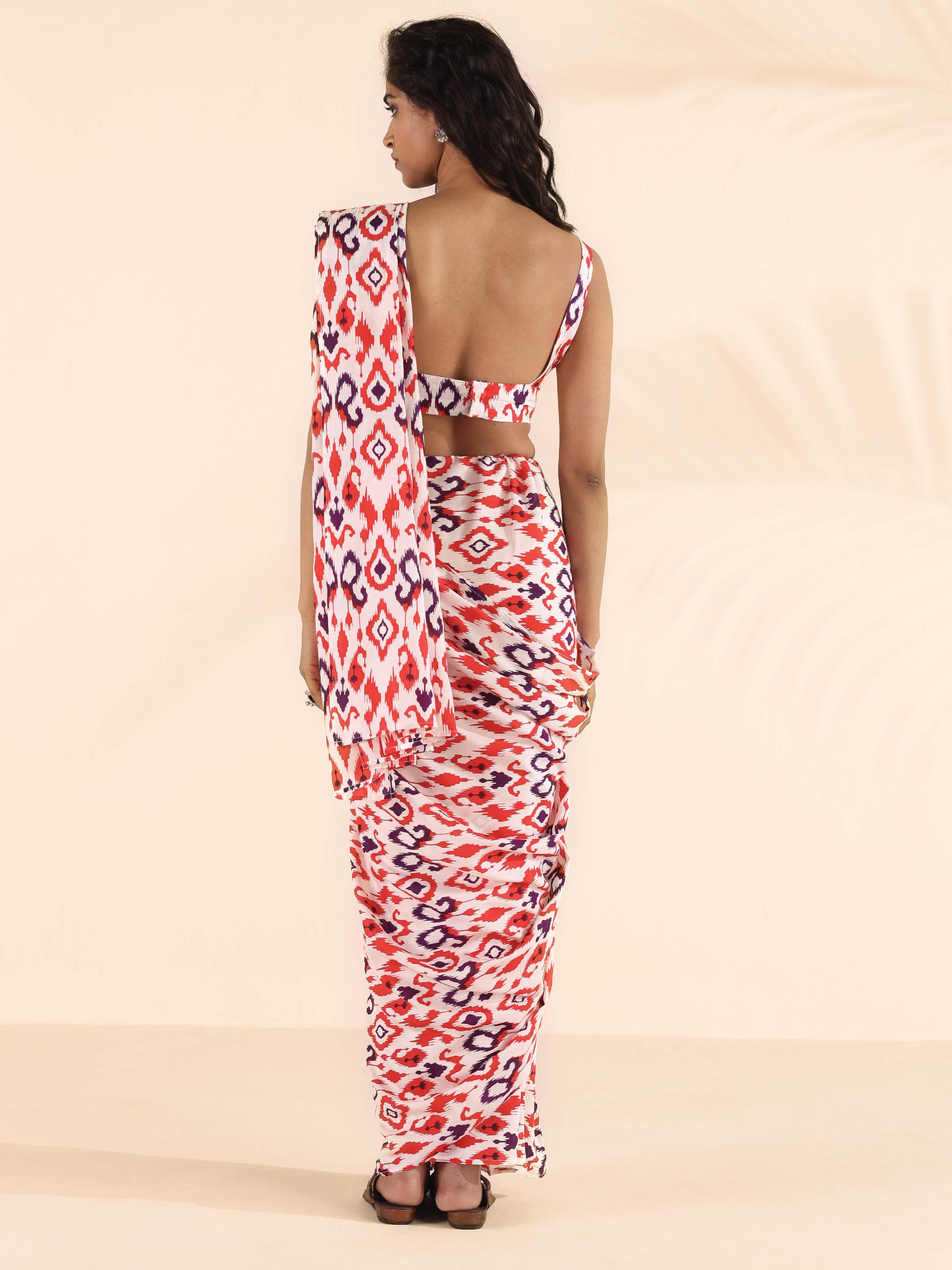 trueBrowns Carrot Muslin Ikat Saree