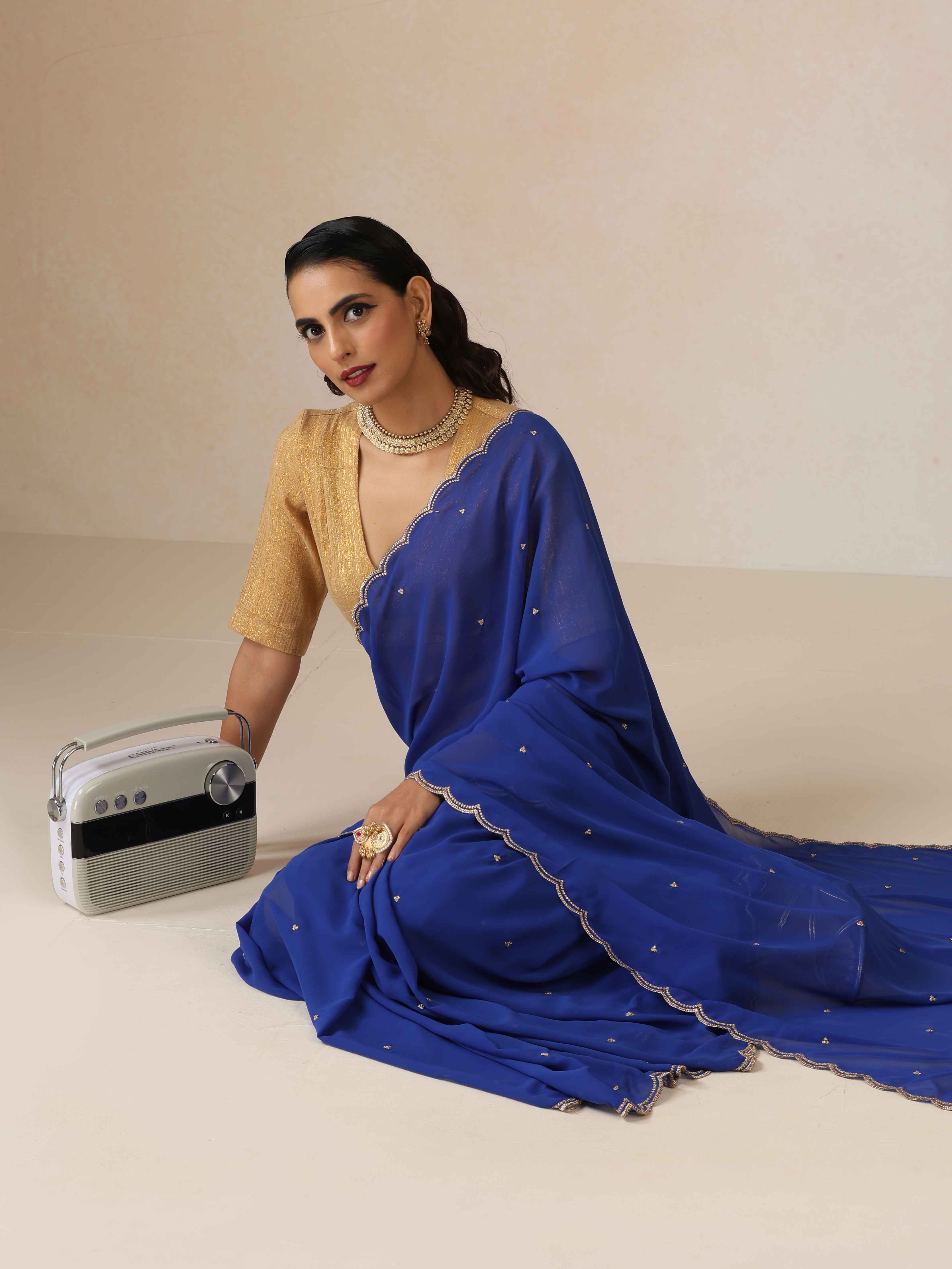 trueBrowns Blue Georgette Embroidered Saree With unstitched Blouse