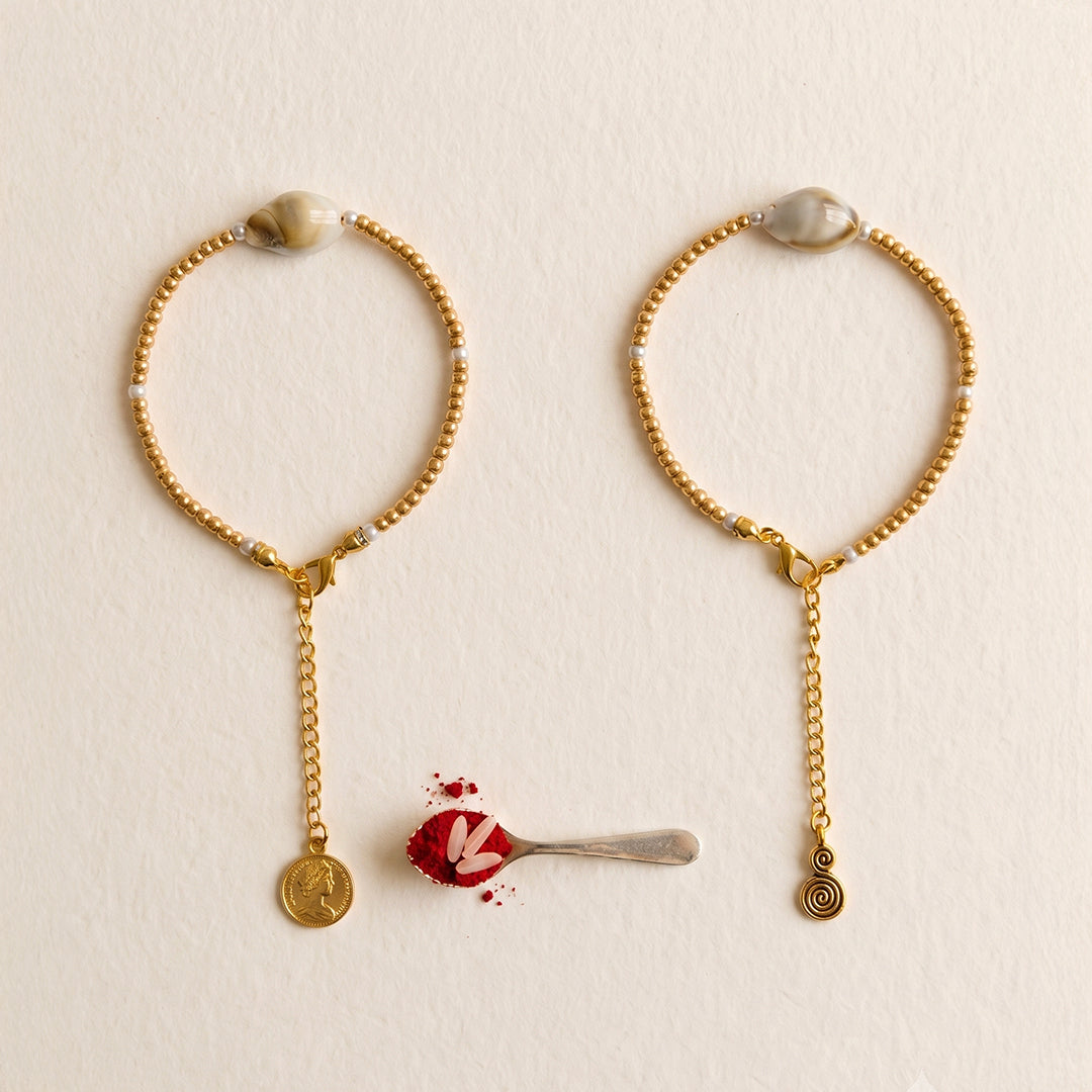 trueBrowns Gold Tone Beads with Shell Couple Bracelet Rakhi