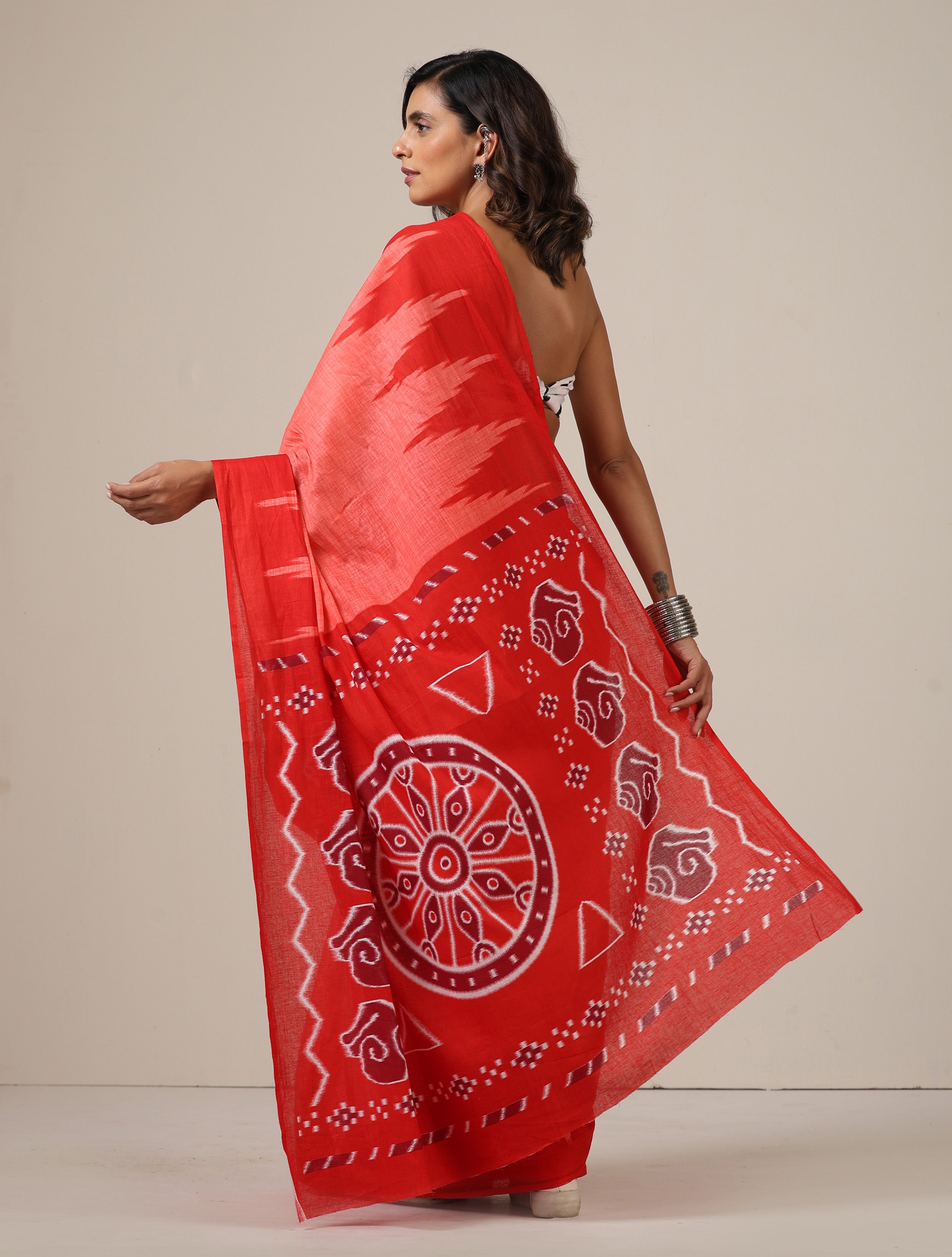 trueBrowns Red Ikat Print Saree With unstitched Blouse