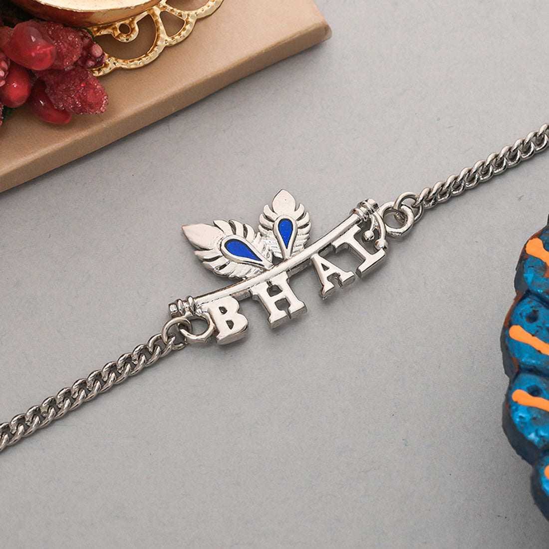 trueBrowns Peacock Feather Motif Silver Plated Bhai Bracelet Rakhi